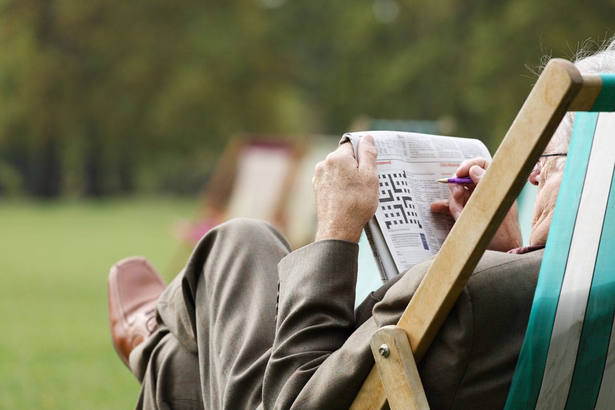 Man Doing Crossword Puzzle